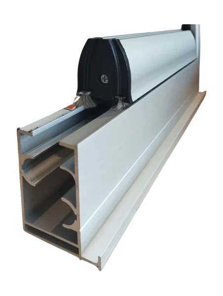 gold-plus-katlanır-cam-balkon-real-cam-balkon-03 Close-up of a sliding door/window roller mounted on a silver aluminum track with a black roller housing and small brush guards on the sides.